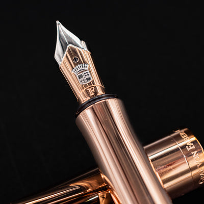 Detailed view of the engraved gold nib of the Graf von Faber-Castell Classic Anello Fountain Pen in Rose.