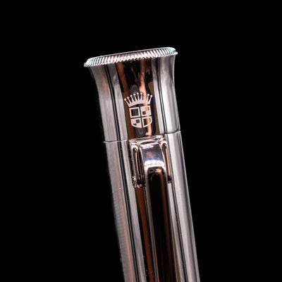 Close-up of the Graf von Faber-Castell Guilloche Fountain Pen cap showing engraved crest and polished metal finish