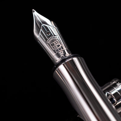 Macro view of Graf von Faber-Castell Guilloche Sage Green Fountain Pen nib with engraved crest