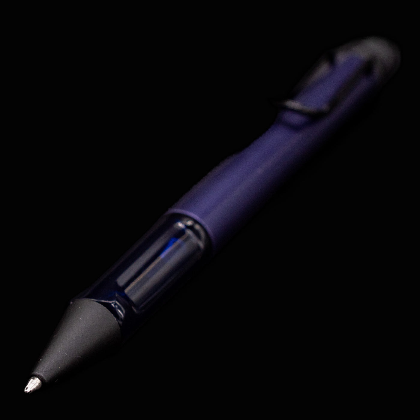 Close-up of LAMY Al-Star Ballpoint Pen in Dark Dusk showing writing tip and grip section