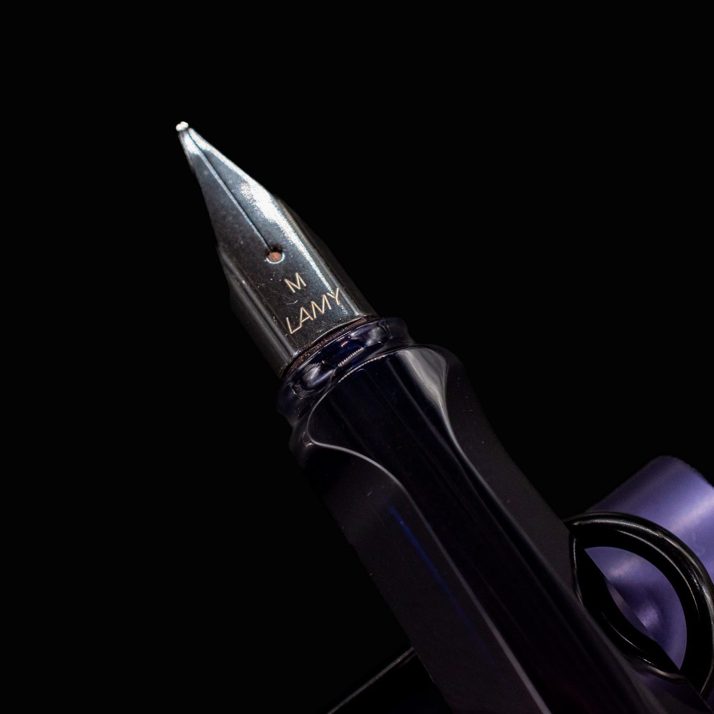 Top-down view of the LAMY Al-Star Fountain Pen Dark Dusk with focus on the nib and grip