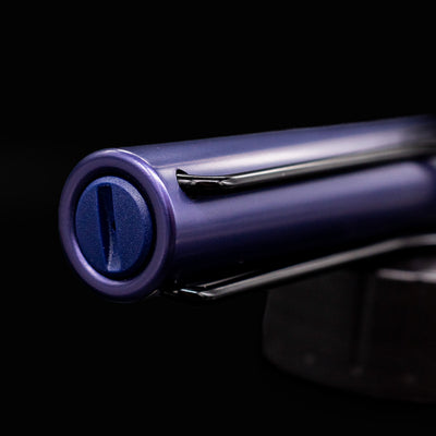Close-up of the top finial and clip on the cap of the LAMY Al-Star Rollerball Pen in Dark Dusk