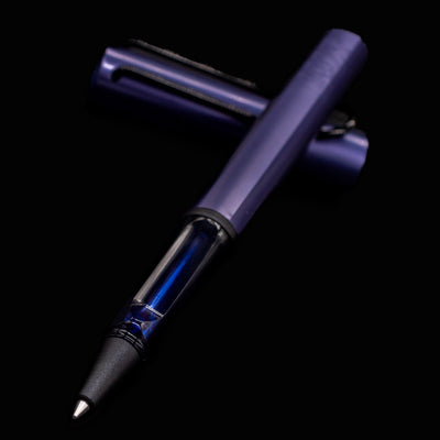 Close-up of the grip and tip of the LAMY Al-Star Dark Dusk Rollerball Pen showing ink feed