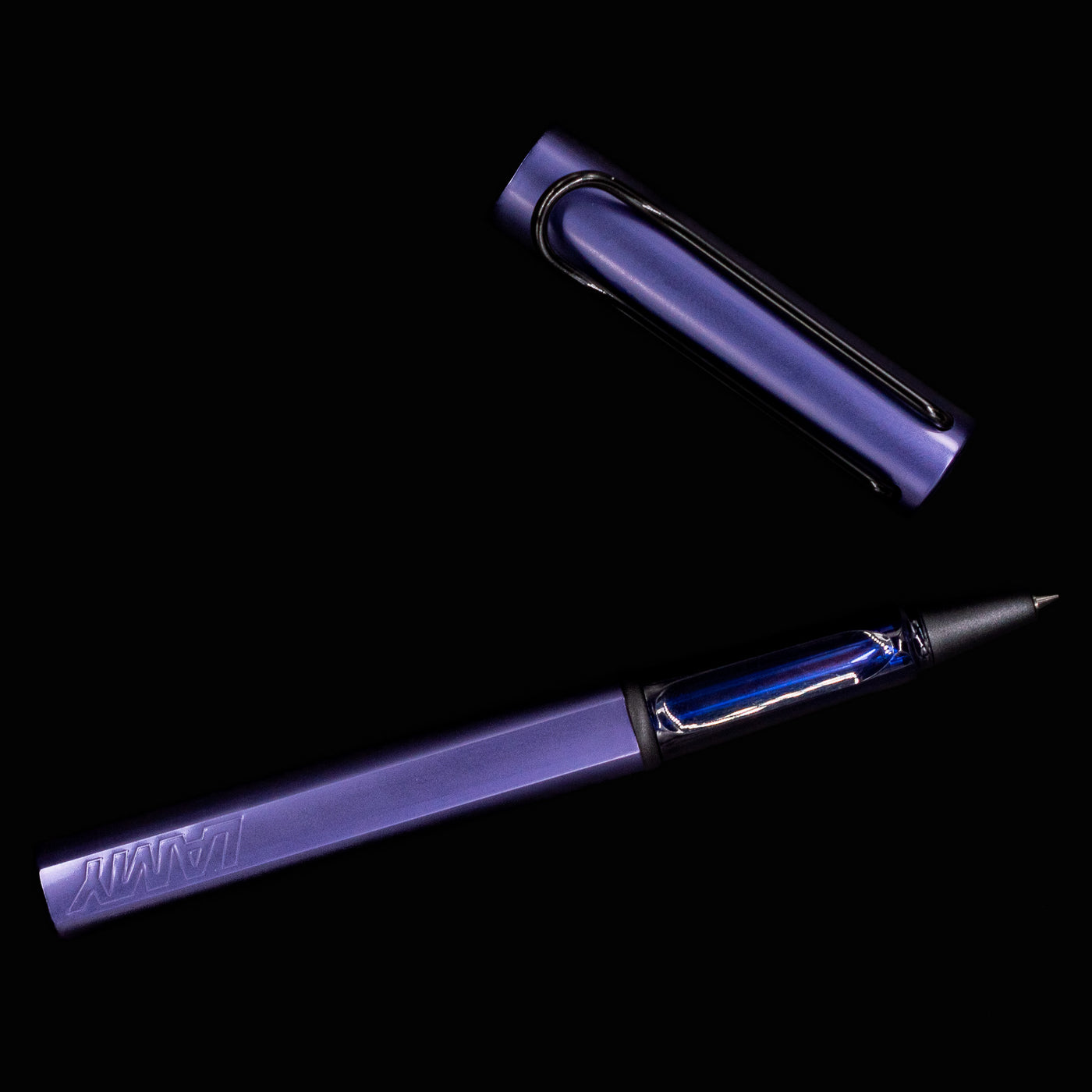 Full open view of the LAMY Al-Star Rollerball Pen in Dark Dusk with cap off and nib exposed
