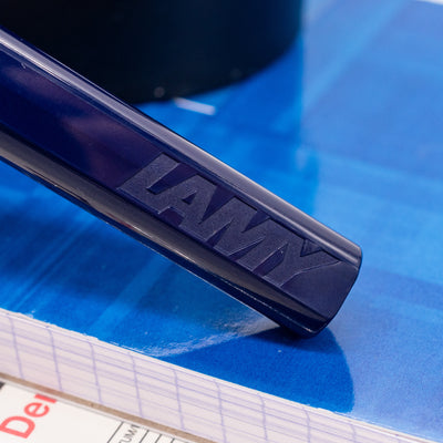 Close-up of the LAMY logo on the Dark Dusk fountain pen barrel