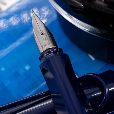 Close-up of silver nib on LAMY Safari Dark Dusk fountain pen