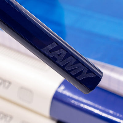 Close-up of the LAMY logo on the barrel of the Dark Dusk rollerball pen