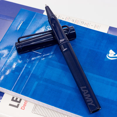 LAMY Safari Dark Dusk rollerball pen resting horizontally on cap