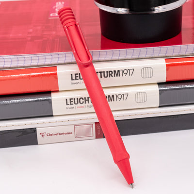 Top view of the LAMY Safari Sunset Coral ballpoint showing click mechanism