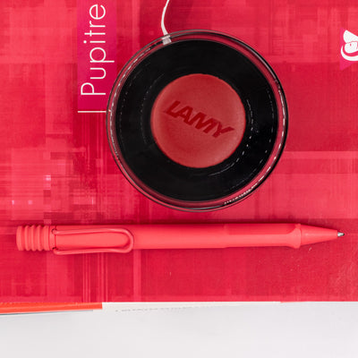 Overhead view of the Safari Sunset Coral ballpoint pen showing full body