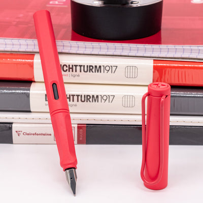 LAMY Safari Sunset Coral fountain pen uncapped with silver steel nib exposed