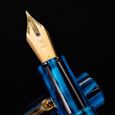 Detailed view of Molteni Modelo 71 Fountain Pen gold nib featuring brand logo and fine nib engraving.