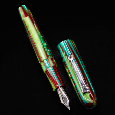 Horizontal view of the uncapped Molteni Modelo 71 Fountain Pen in Green and Rhodium showing nib and barrel