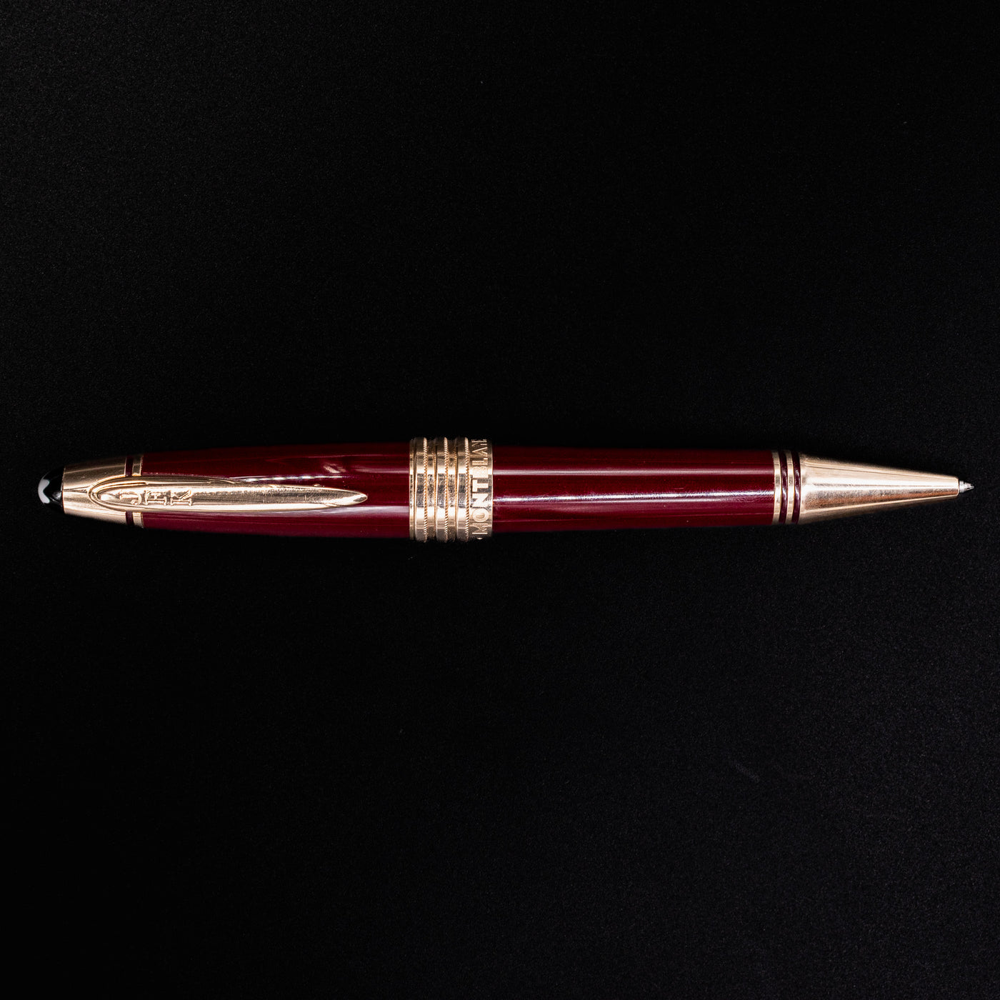 Full horizontal view of the Montblanc John F. Kennedy Burgundy Ballpoint Pen showcasing sleek barrel and clip design.