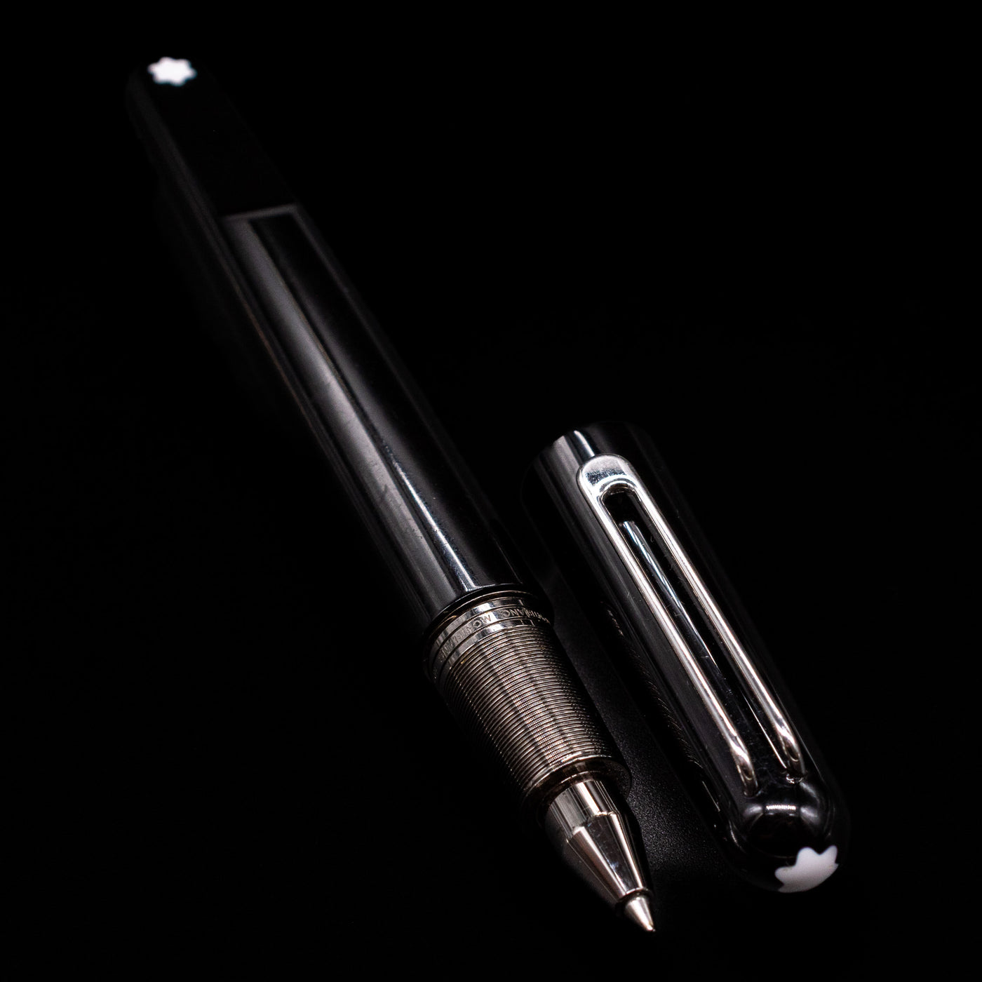 montblanc black resin rollerball pen with magnetic cap