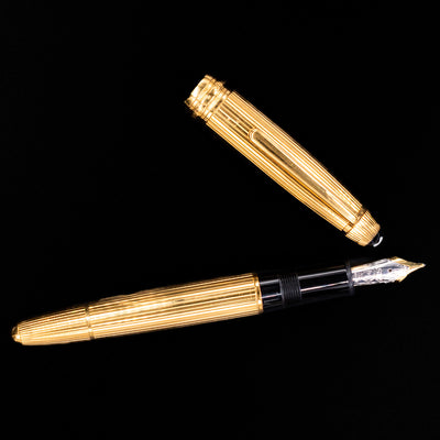 Horizontal top view of the Montblanc Meisterstück 146V Vermeil Pinstripe LeGrand Fountain Pen uncapped