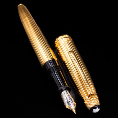 Side-by-side view of the Montblanc Meisterstück 146V Vermeil Pinstripe LeGrand Fountain Pen and its cap