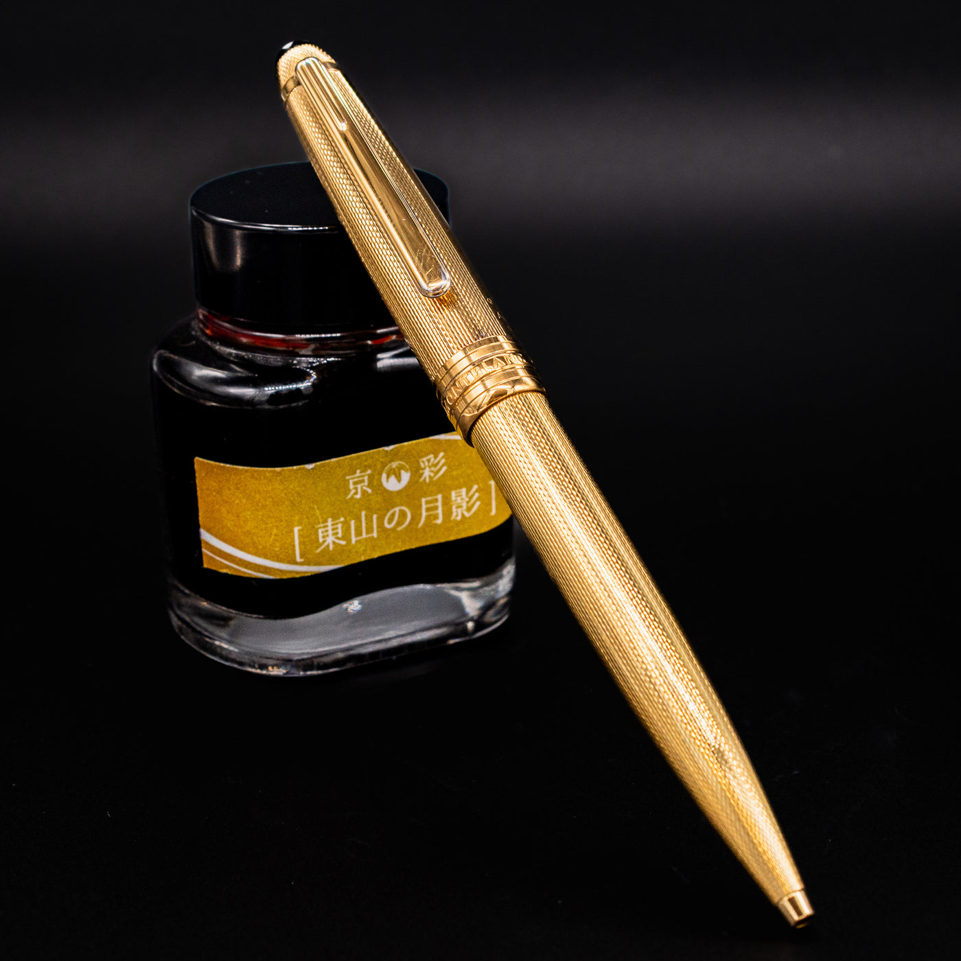 Montblanc Meisterstück 164V Solitaire Vermeil Barley Ballpoint Pen shown with ink bottle – preowned luxury writing instrument