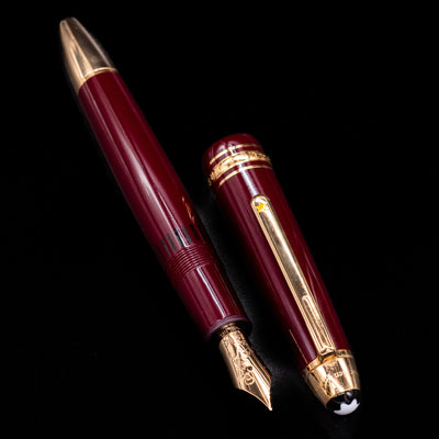 Montblanc Le Petit Prince Planet Fountain Pen flat lay with cap and nib side by side