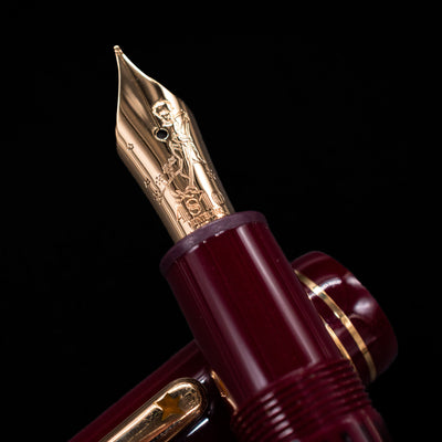 Montblanc Le Petit Prince Planet Fountain Pen uncapped with nib and cap visible