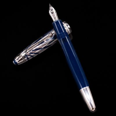 Close-up of the nib and blue resin cap of the Montblanc Meisterstück The Origin Collection Solitaire Doue LeGrand Fountain Pen.