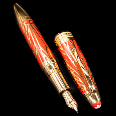 Montblanc Meisterstuck The Origin Collection Solitaire Doue LeGrand Fountain Pen uncapped with nib and silver cap visible.