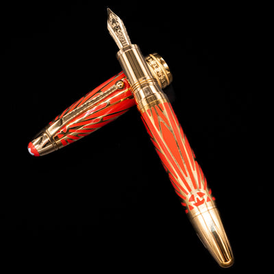 Top-down view of the uncapped Montblanc Meisterstuck The Origin Collection Solitaire Doue LeGrand Fountain Pen with decorative cap beside it.