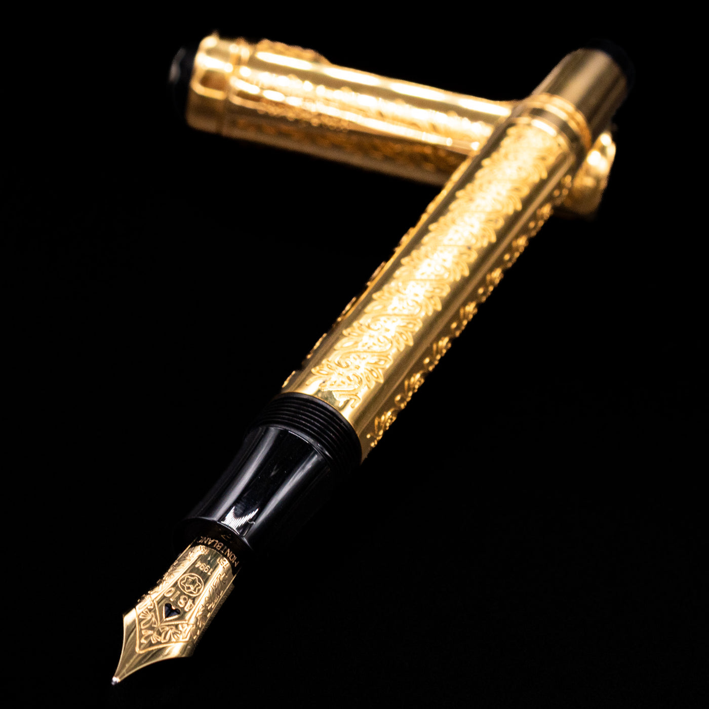 Close-up of Montblanc Patron of Art Louis XIV Fountain Pen nib and gold-plated pinstripe barrel