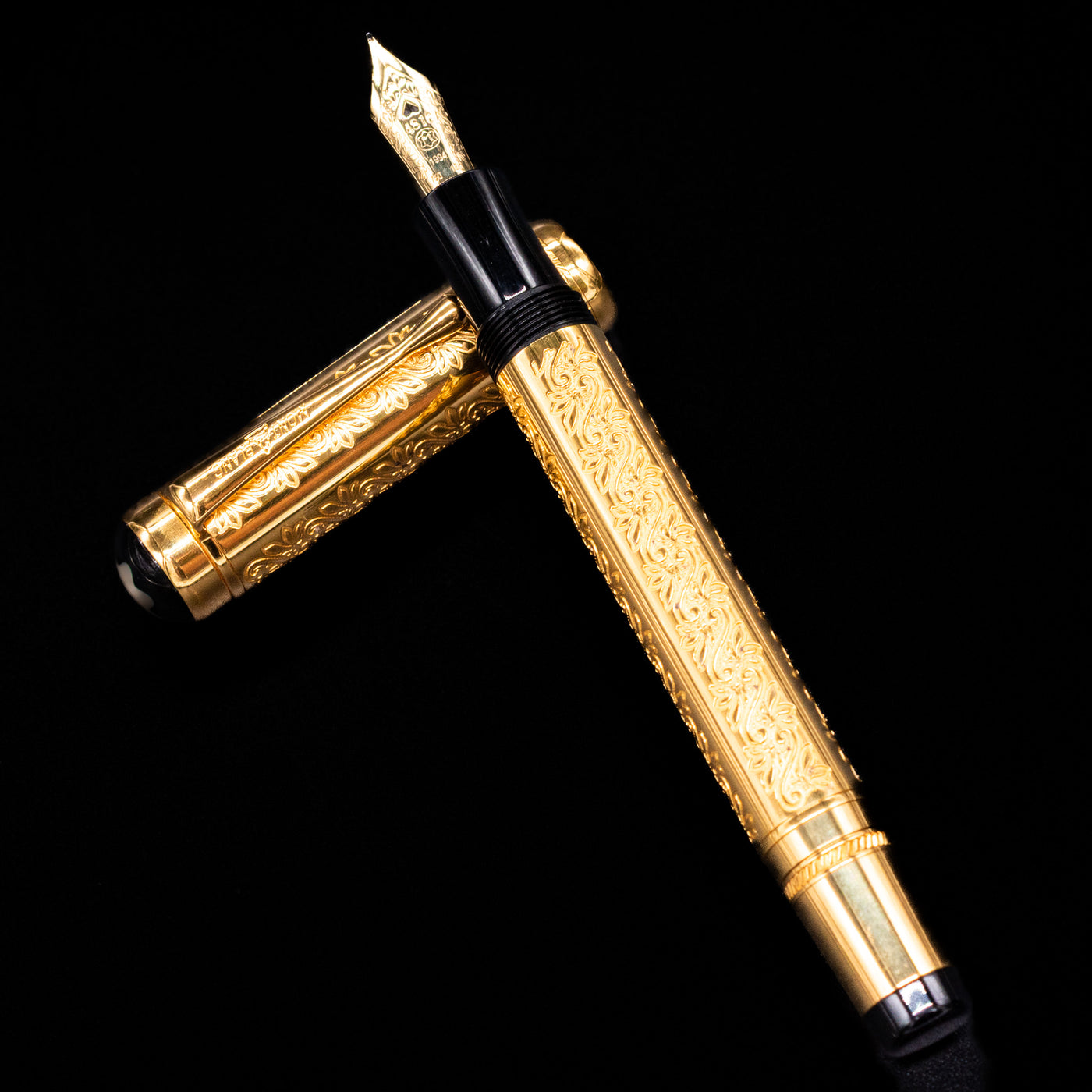 Diagonal overhead shot of Montblanc Patron of Art Louis XIV 4810 Fountain Pen with cap and barrel visible