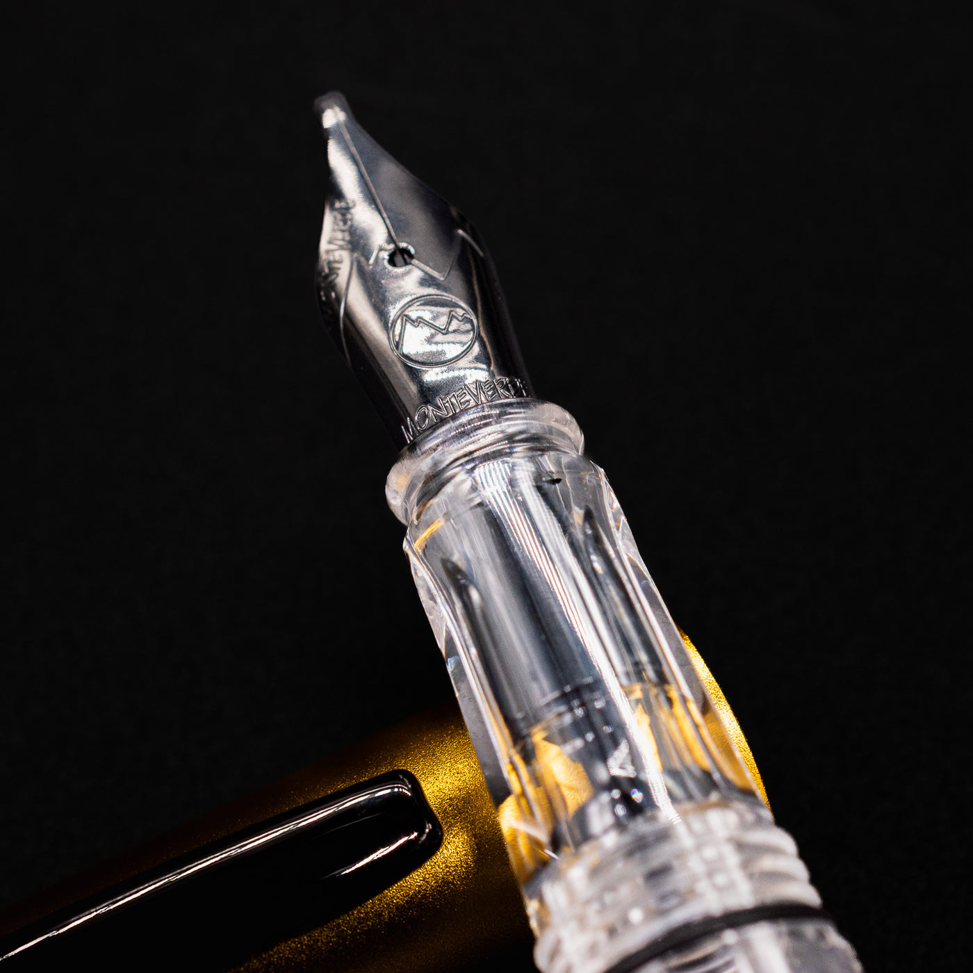 Detailed close-up of the Monteverde MP1 fountain pen nib with engraved Monteverde logo.