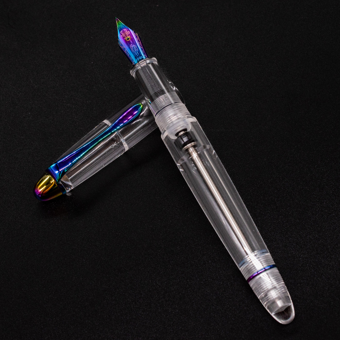 Nahvalur Fathom Pride 2025 fountain pen open with cap off, rainbow trim visible