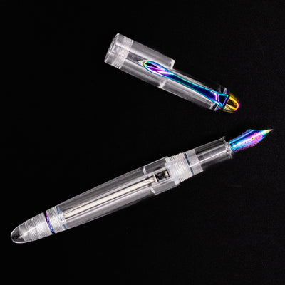 Nahvalur Fathom Fountain Pen Pride 2025 open with rainbow nib and cap beside it