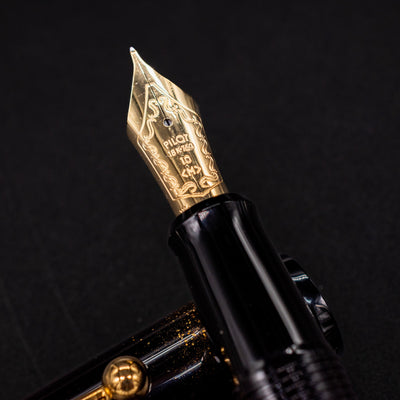 Detailed closeup of Namiki Yukari Double Crane 18k gold nib.
