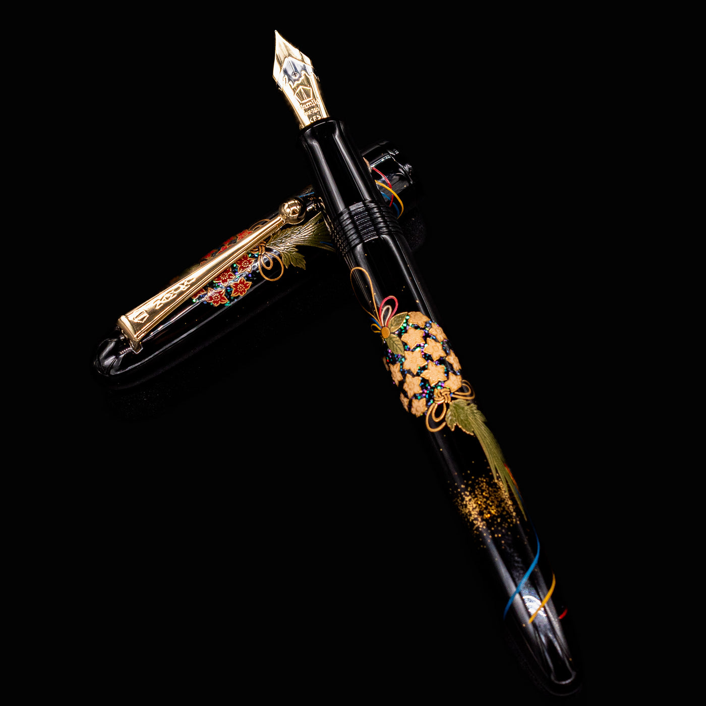 Namiki Yukari Herb Decoration Fountain Pen with intricate floral maki-e design on barrel and gold nib