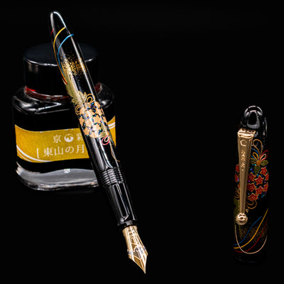 Namiki Yukari Maki-e Fountain Pen - Herb Decoration with detailed view of 18k gold nib and maki-e artwork
