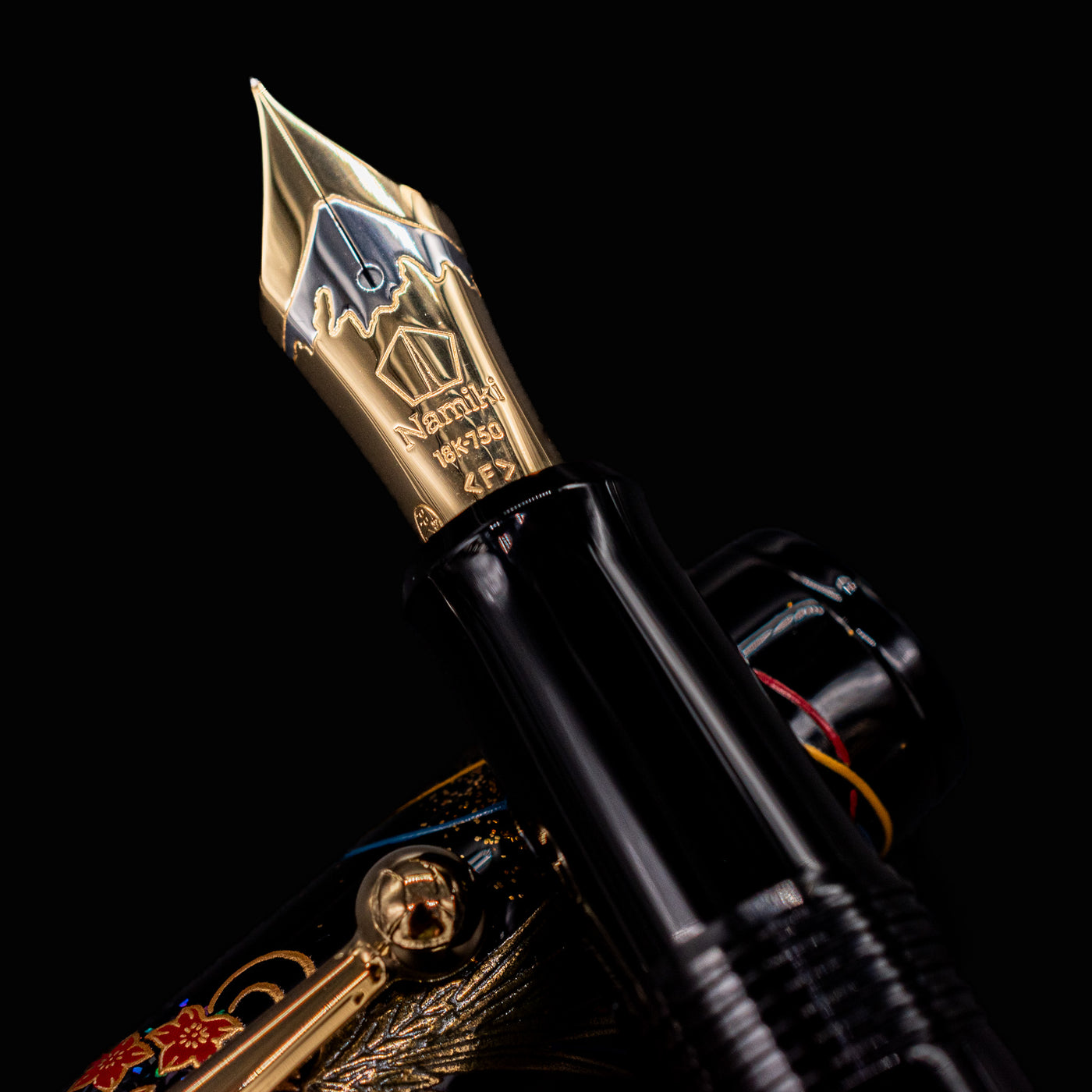Close-up of Namiki Yukari Herb Decoration Fountain Pen nib featuring Mt. Fuji motif