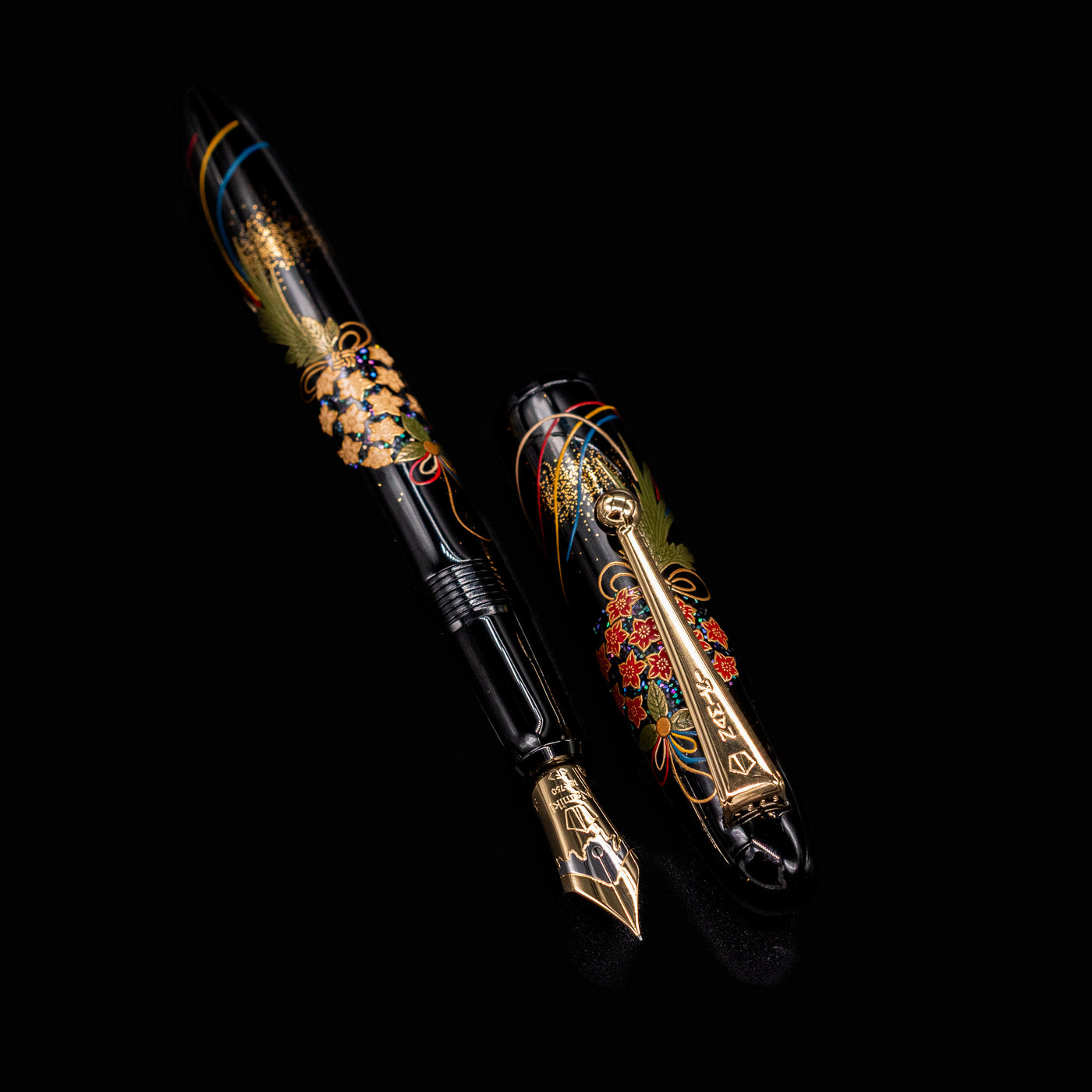 Full view of uncapped Namiki Yukari Maki-e Fountain Pen - Herb Decoration with floral and ribbon motifs