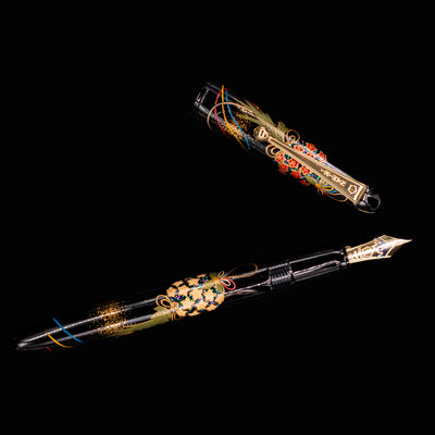 Namiki Yukari Herb Decoration Fountain Pen uncapped with cap placed beside, showing floral maki-e clip