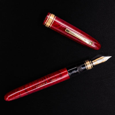 Overhead angle of the OMAS AM87 Briarwood fountain pen uncapped
