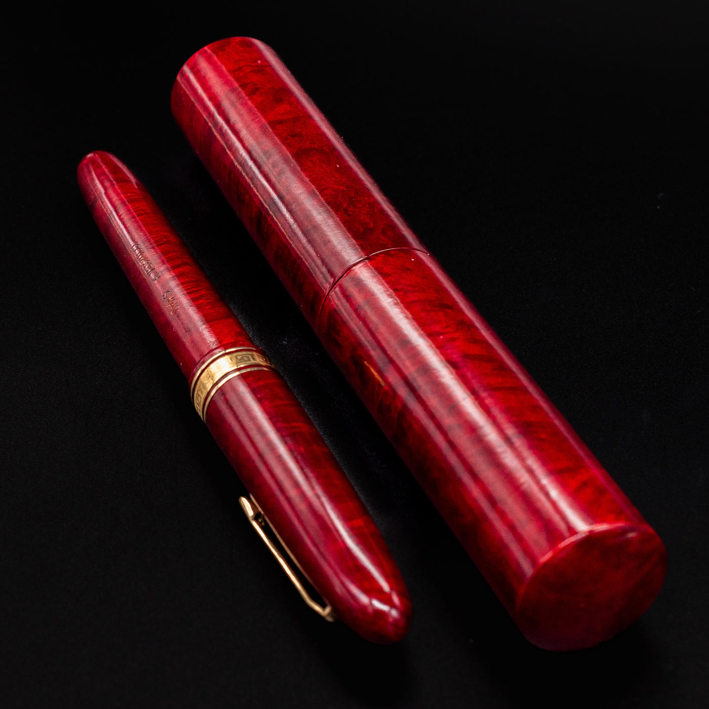 OMAS AM87 Briarwood fountain pen and its matching briarwood case displayed side by side