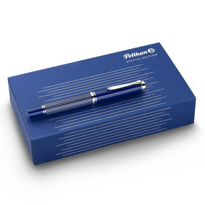 Pelikan Souverän M815 Metal Striped Blue fountain pen capped and displayed on special edition gift box