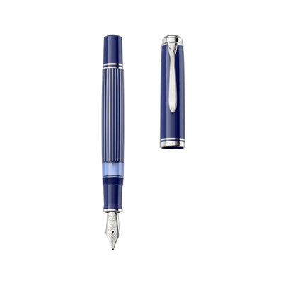 Close-up of Pelikan M815 Metal Striped Blue uncapped fountain pen showing cap and striped barrel detail