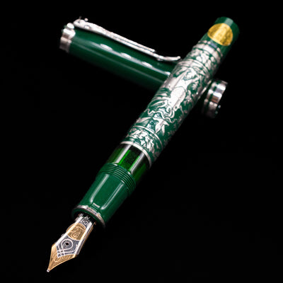 Pelikan M915 Hunting Limited Edition 1994 Fountain Pen shown uncapped with nib and engraved barrel visible.