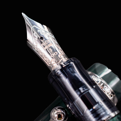 Macro shot of Pilot Custom 74 Forest Green 14k nib showing engraved details
