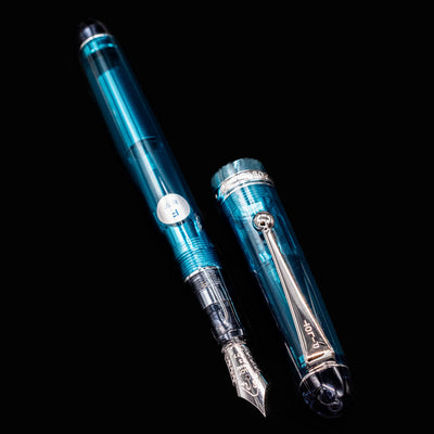 Pilot Custom 74 Teal Fountain Pen with cap off showing full transparent barrel and nib