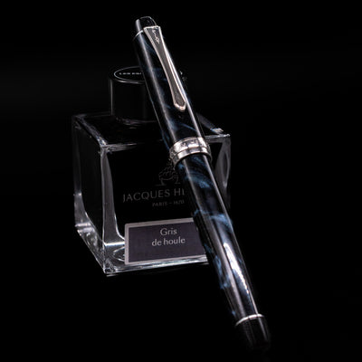 Side view of the capped Pilot Custom Heritage SE Fountain Pen in Blue Marble with silver clip and marbled finish.