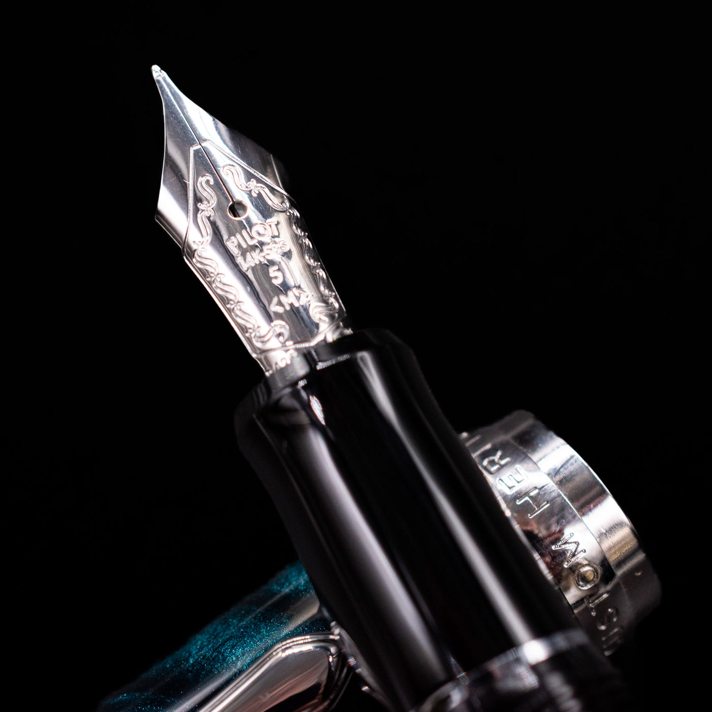 Detailed view of the engraved silver nib on the Pilot Custom Heritage SE Green Marble Fountain Pen
