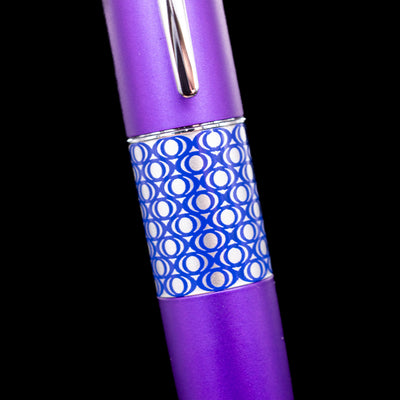 Close-up of the barrel band on the Pilot Metropolitan Pop Ballpoint Pen in Purple featuring a silver and blue geometric pattern