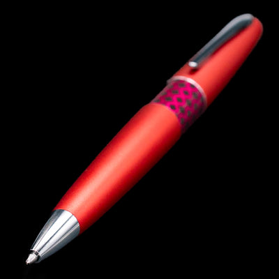 Pilot Metropolitan Pop Ballpoint Pen in red shown at an angle highlighting the chrome tip and red metallic barrel.