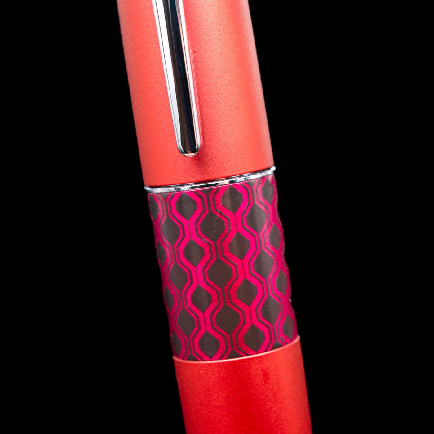 Close-up of the Pilot Metropolitan Pop Ballpoint Pen in red showing the geometric pop art design on the center band.